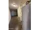 The garage includes a hot water tank, storage space, and access to the outside at 324 E Riviera Dr, Tempe, AZ 85282