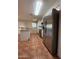 Kitchen featuring tile flooring and stainless appliances at 324 E Riviera Dr, Tempe, AZ 85282