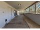 Spacious, covered patio with lattice panels, ready for outdoor enjoyment at 324 E Riviera Dr, Tempe, AZ 85282
