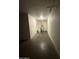 This utility room offers a sink, storage, and water heater at 324 E Riviera Dr, Tempe, AZ 85282