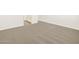 A bedroom features neutral carpet and white walls, adjacent to the bathroom at 3498 N Camden Dr, Florence, AZ 85132