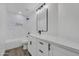 Bathroom featuring stylish vanity and tiled shower and tub combination at 3926 E Coconino St, Phoenix, AZ 85044