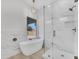 Bright bathroom featuring soaking tub, glass enclosed shower, and modern vanity at 3926 E Coconino St, Phoenix, AZ 85044