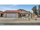 Charming single-story home featuring a well-maintained desert landscape and a red tile roof at 3926 E Coconino St, Phoenix, AZ 85044