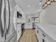 Bright, updated kitchen featuring stainless steel appliances, quartz countertops, and a modern design at 3926 E Coconino St, Phoenix, AZ 85044