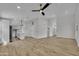 Spacious living room featuring recessed lighting, neutral walls, and wood-look flooring at 3926 E Coconino St, Phoenix, AZ 85044
