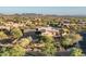 Panoramic aerial view of this desert estate with a private pool, patio, and expansive desert landscape at 40039 N 107Th Pl, Scottsdale, AZ 85262