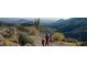 Scenic hiking trail amidst stunning desert landscape, ideal for outdoor adventures and Gathering excursions at 40039 N 107Th Pl, Scottsdale, AZ 85262