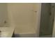 Clean bathroom featuring a bathtub, shower stall, and modern fixtures at 46129 W Barbara Ln, Maricopa, AZ 85139