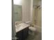Bathroom featuring shower, vanity and toilet at 46129 W Barbara Ln, Maricopa, AZ 85139