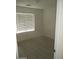 Bright bedroom featuring a large window allowing for ample natural light at 46129 W Barbara Ln, Maricopa, AZ 85139