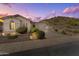 Charming single-Gathering home with desert landscaping, three-car garage, and tile roof in a great location at 6106 W Spur Dr, Phoenix, AZ 85083