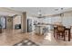 Open kitchen with island seating and stainless appliances offers a large and inviting space at 6106 W Spur Dr, Phoenix, AZ 85083