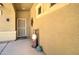 Cozy front entrance with security door, stylish decorations, and desert-themed accents at 708 E Dry Creek Rd, San Tan Valley, AZ 85143