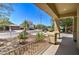 Charming front porch with desert landscaping views and a covered entryway at 708 E Dry Creek Rd, San Tan Valley, AZ 85143
