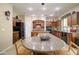 Spacious kitchen features granite countertops, stainless steel appliances, and cabinetry at 708 E Dry Creek Rd, San Tan Valley, AZ 85143