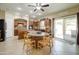 Spacious kitchen featuring a center island, ample counter space, and sliding glass door at 708 E Dry Creek Rd, San Tan Valley, AZ 85143