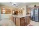 Spacious kitchen features a large granite island, stainless steel appliances, and an open design at 708 E Dry Creek Rd, San Tan Valley, AZ 85143