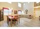 Open-concept living and dining area with high ceilings and lots of natural light at 708 E Dry Creek Rd, San Tan Valley, AZ 85143