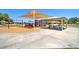 Playground with swings, play equipment, and covered picnic tables in a well-maintained community park at 708 E Dry Creek Rd, San Tan Valley, AZ 85143
