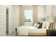 Cozy bedroom showcasing natural light and a walk-in closet at 9532 W Pinchot Ave, Phoenix, AZ 85037