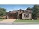 Charming single-Gathering home with a two-car garage and well-maintained landscaping at 9538 W Avalon Dr, Phoenix, AZ 85037
