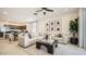 Inviting living room featuring a neutral color palette, comfortable seating, and modern furnishings at 9538 W Avalon Dr, Phoenix, AZ 85037