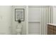 Bathroom showcasing toilet, artwork, and shower with neutral color shower curtain at 9552 W Verde Ln, Phoenix, AZ 85037