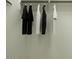 Image of closet with black and white clothing hanging on rod at 9552 W Verde Ln, Phoenix, AZ 85037