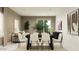 Stylish dining room with modern furniture, elegant decor, and plenty of natural light at 9552 W Verde Ln, Phoenix, AZ 85037