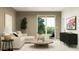 Comfortable living room with stylish furnishings, neutral tones, and inviting ambiance at 9552 W Verde Ln, Phoenix, AZ 85037