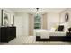 Cozy main bedroom with minimalist design, stylish accents, and a tranquil retreat at 9552 W Verde Ln, Phoenix, AZ 85037