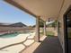 Covered patio view of the pool and stepping stones at 11006 S Indian Wells Dr, Goodyear, AZ 85338