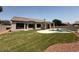 A well maintained backyard with pool at 11006 S Indian Wells Dr, Goodyear, AZ 85338