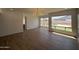 Bright open-concept living room features recessed lighting and backyard views at 11006 S Indian Wells Dr, Goodyear, AZ 85338