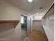 Walk-in closet with shelving and sliding glass door to the shower at 11006 S Indian Wells Dr, Goodyear, AZ 85338