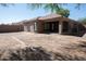 View of the home's backyard, showcasing the patio area and potential for landscaping at 1381 E Prickly Pear Dr, Casa Grande, AZ 85122