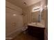 Clean, well-maintained bathroom with shower-tub combo, single sink vanity, and tile floors at 1381 E Prickly Pear Dr, Casa Grande, AZ 85122