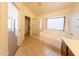 Bright primary bathroom showcasing a glass-enclosed shower, soaking tub, and a dual-sink vanity at 1381 E Prickly Pear Dr, Casa Grande, AZ 85122