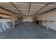 Spacious garage with built-in shelving and ample room for storage and vehicles at 1381 E Prickly Pear Dr, Casa Grande, AZ 85122