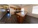 Bright kitchen with granite counters, stainless appliances, and a large island counter at 1381 E Prickly Pear Dr, Casa Grande, AZ 85122