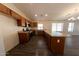Kitchen featuring stainless steel appliances, granite countertops, and wood cabinetry at 1381 E Prickly Pear Dr, Casa Grande, AZ 85122