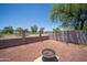 Backyard featuring a fire pit and block wall fencing offering privacy and an enjoyable outdoor space at 17810 N 34Th Pl, Phoenix, AZ 85032