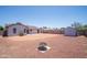 Spacious backyard with a fire pit, storage shed, and plenty of room to relax and entertain at 17810 N 34Th Pl, Phoenix, AZ 85032