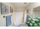 Clean bathroom features shower-tub combo, decorative art, and a vanity with an appealing decorative plant at 17810 N 34Th Pl, Phoenix, AZ 85032