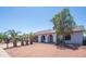 Charming single-story home with arched entry, desert landscaping, and a spacious two-car garage at 17810 N 34Th Pl, Phoenix, AZ 85032