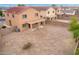 A spacious backyard with low maintenance landscaping and a covered patio, perfect for outdoor living at 18774 N Ibis Way, Maricopa, AZ 85138