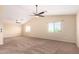 Expansive bonus room featuring carpet, recessed lighting, ceiling fan and natural light at 18774 N Ibis Way, Maricopa, AZ 85138