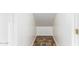 Walk in closet showing ample storage space with tile flooring at 18774 N Ibis Way, Maricopa, AZ 85138