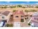 Inviting two-story home with a well-maintained yard and a two-car garage at 18774 N Ibis Way, Maricopa, AZ 85138